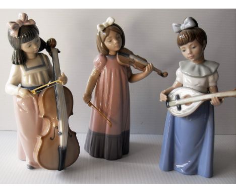 Three NAO figurines of young girls playing musical instruments (3) all without damage or repair 