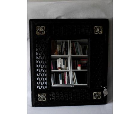 A Liberty-style wall mirror with Moroccan-style mosaic and bobbin carved decoration, 46 x 40 cm 
