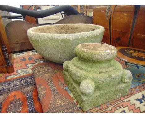 A large stone planter on stand, 82cms D