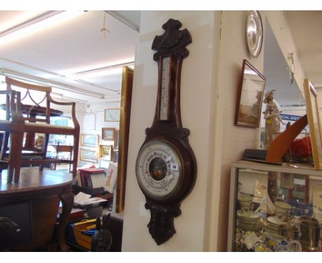 A Mahogany barometer/ thermometer