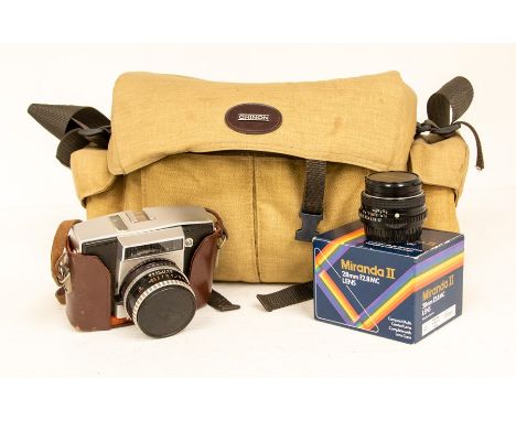 Cased Pentina camera with accessories and carry case