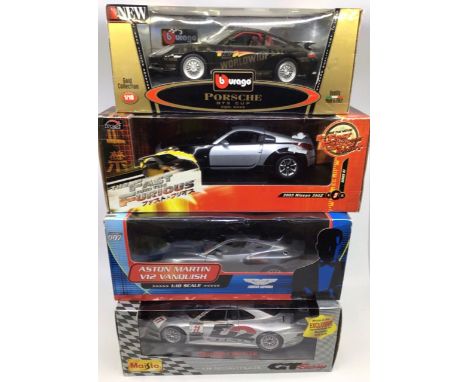 Diecast: A collection of assorted diecast vehicles to include: 1:18 scale Mercedes CLK-GTR; Aston Martin V12 Vanquish 007; Ni