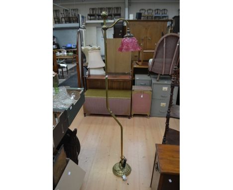 Early 20th Century brass floor room lamp, with cranberry glass shade