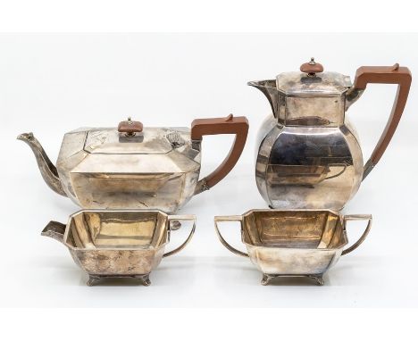 An Art Deco silver matched four tea service, comprising teapot, water jug, milk jug and sugar bowl, by James Dixon &amp; Sons