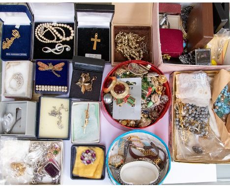 A collection of costume jewellery to include vintage clip on earrings, faux pearl necklace, paste set brooches and necklaces,