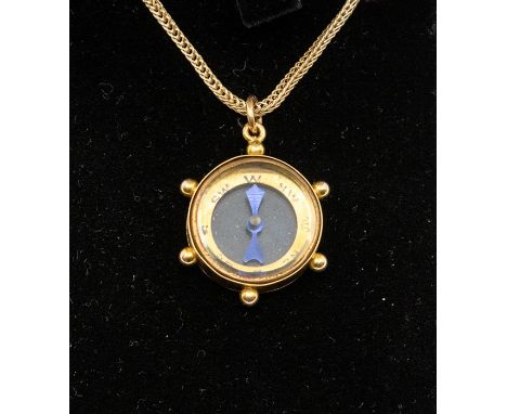 A 9ct gold compass pendant, on 9ct chain, approx 7.6gms gross&nbsp;