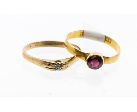 A garnet set 22ct gold ring, the stone approx 4mm, band width approx 3.5mm, size O, total gross weight approx 1.7gms along wi