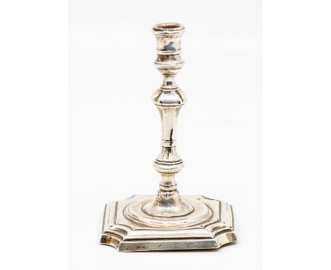 A Victorian silver chamber stick, tapering stem with knop on shaped square base, spool shaped nozzle, by Thomas Bradbury, Lon