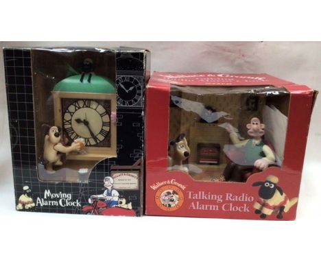 Wallace & Gromit Talking Radio Alarm Clock and Moving Alarm Clock. Both boxed.