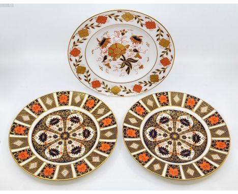 Two large Royal Crown Derby 1128 Imari dinner plates, first quality along with Royal Crown Derby 8687 plate