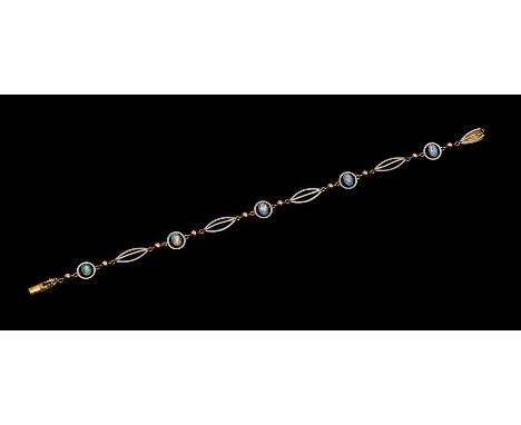 An Art Deco opal and 15ct gold and platinum bracelet, comprising five round platinum targets each set with an oval opal, each