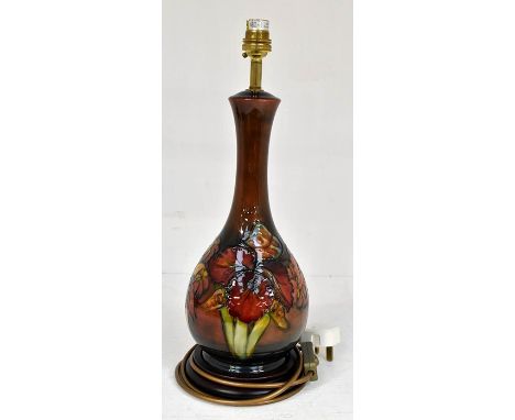 The Mitchell Collection of Moorcroft Pottery: A Walter Moorcroft Flambe 'Orchid' pattern table lamp on blue/green ground with