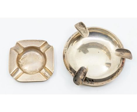 A Continental 938 standard plain circular silver ash tray and another shaped square engine turned ash tray, both marked SIL V