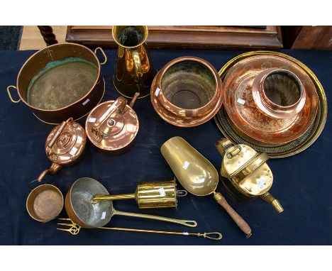 A collection of brass and copper to include: pans, trays, jugs, bowls, toasting fork (Q)
