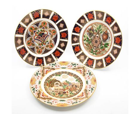 A collection of Royal Crown Derby Imari Christmas plates and teddy, drummer boy, plates (7)