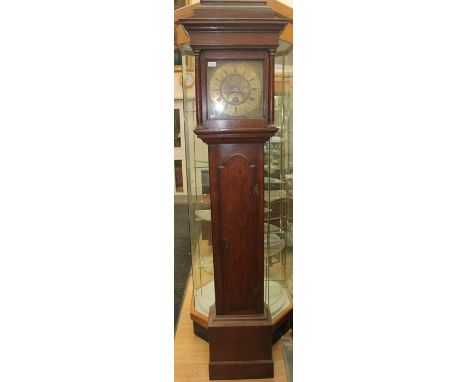 A George III oak 30 hour longcase clock, the dial inscribed 'J. Boot, Sutton', having a brass dial and Roman numerals