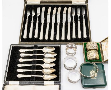 A collection of silver to include: George VI silver handled case of six fruit knives and forms,9;. by BB &amp; S., Sheffield,