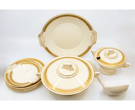 A 1930's cream and gilt Burleigh ware dinner service, with meat plates and tureens