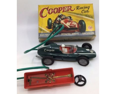 Collection of assorted vintage toys to include Plastic Tank Transporter with Tank (some damage), ELM battery operated Cooper 