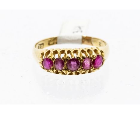 An 18ct gold and ruby set Victorian boat head ring, comprising five round graduated rubies, size O, total gross weight approx