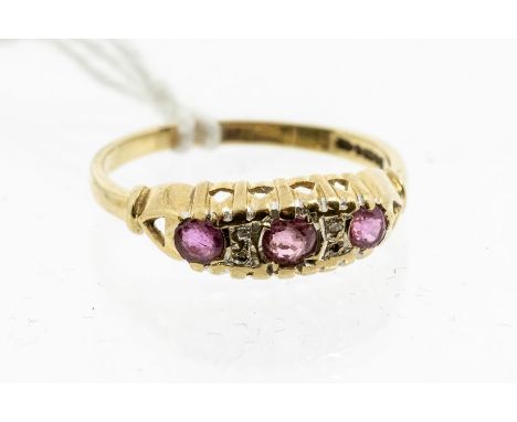 A pink sapphire and diamond set 9ct gold ring, comprising three round cut pink sapphires with diamond set accents, size P1/2,