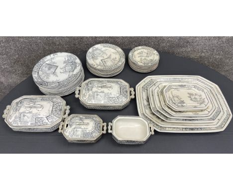 A 19th century part dinner service to include twelve dinner plates, graduated serving platters, lidded tureens etc., marked B