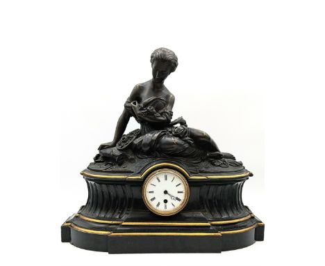 A 19th century French bronze and slate figural mantle clock in the style of Raingo Freres, the plinth footed slate base havin