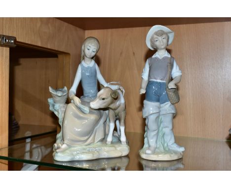 TWO LLADRO FIGURES/GROUP 'GIRL WITH CALF', No 4513, sculptor Fulgencio Garcia 1969, retired 1978, height 21cm and 'Fisher Boy