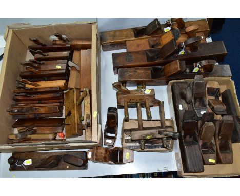FIVE WOODEN PLANES, comprising of a Compass coffin plane 7½ inches long, three other coffin planes, a 17 inch plane and a mou