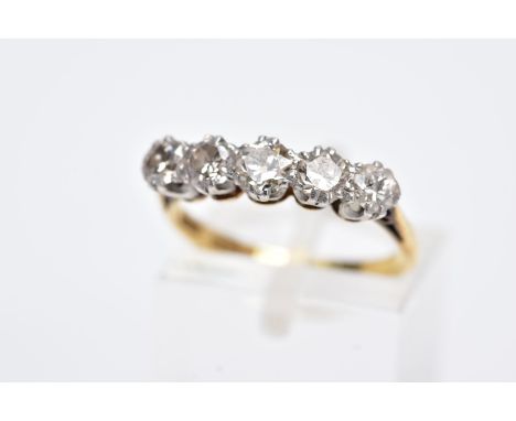 AN EARLY TO MID TWENTIETH CENTURY FIVE STONE DIAMOND RING, estimated old Swiss cut diamond, weight 0.75cts, colour assessed a