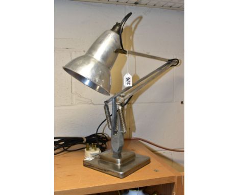 A VINTAGE HERBERT TERRY ANGLEPOISE LAMP, polished aluminium finish, on a stepped square base, not PAT tested