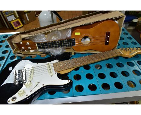 A CHILD SIZE CRUISER BY CRAFTER ELECTRIC GUITAR, together with a boxed 'Vintage' plastic ukulele (2)