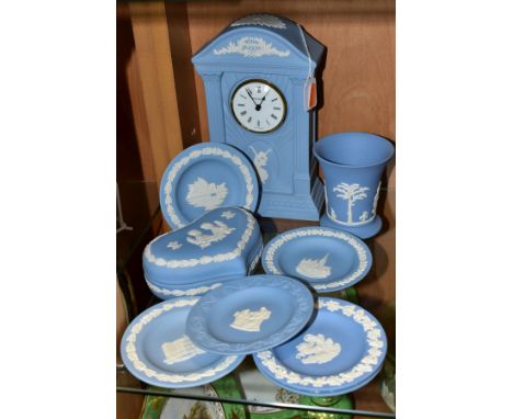 A GROUP OF WEDGWOOD PALE BLUE JASPERWARES, comprising a Dancing Hours Millennium clock, 'AD2000', height 22cm, a vase, height