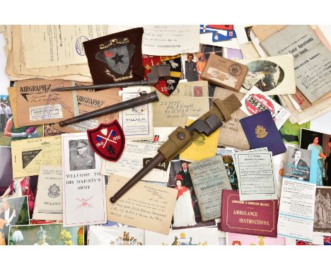 A BOX CONTAINING A LARGE AMOUNT OF PAPER EPHEMERA, including military documents, postcards, telegrams and two WWII era Britis
