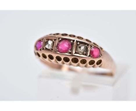 AN EARLY 20TH CENTURY 9CT GOLD BOAT RING, set with two rose cut diamonds, a single circular cut ruby and two circular cut red