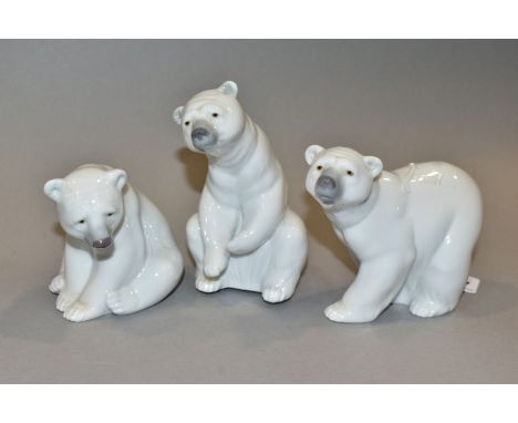 THREE LLADRO POLAR BEARS 'Attentive Polar Bear' No 1207, height 10cm, 'Resting Polar Bear' No 1208, height 12cm and 'Seated P