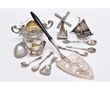 A SELECTION OF CONTINENTAL SILVER ITEMS, to include a miniature windmill with a stamp mark for the Netherlands, a miniature s