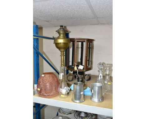 A SMALL GROUP OF LAMPS, DECANTERS, TANKARDS, etc, including a copper octagonal lantern on a wrought iron base, lacks glass pa