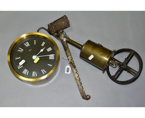 A VICTORIAN BRASS BOTTLE JACK, 'Salters Economical', with bracket, wheel and key, together with a Gibson wall clock, Roman nu