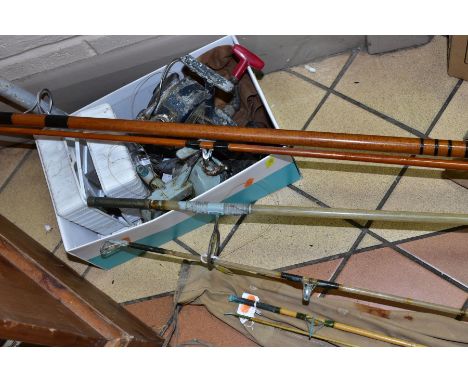 VINTAGE FISHING TACKLE IN DISTRESSED CONDITION, to include a 12 foot fibreglass rod by the Modern Arms Company, another fibre