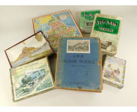 G.W.R. PUZZLES ETC. A Chad Valley G.W.R. 'Torbay Express' jig-saw puzzle, two other Chad Valley plywood puzzles &amp; four ot