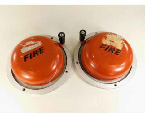 FIRE BELLS. Two fire bells by the Perry Barr Metal Co. Ltd. Stamped with Government broad arrow mark.