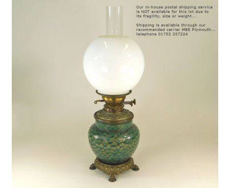 BURMANTOFTS. An oil lamp, the Burmantofts ceramic body with the 'cracked ice' pattern. Cast brass mounts &amp; white globe sh