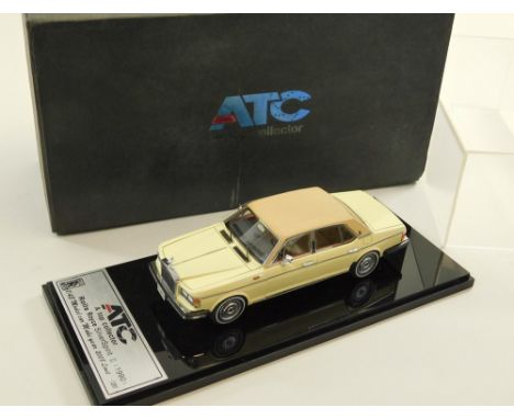 ATC ROLLS-ROYCE MODEL. An ATC 1/43 scale model of a 1990 Silver Spirit II. Mint with Perspex cover &amp; outer box.