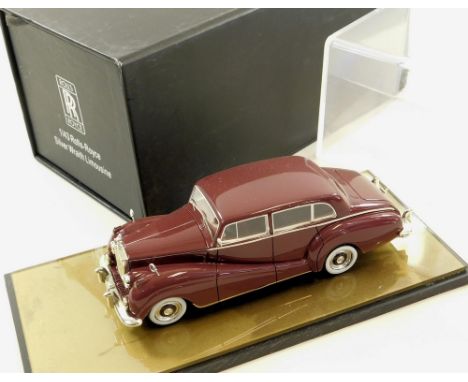 ATC ROLLS-ROYCE MODEL. An ATC 1/43 scale model of a Silver Wraith Limousine. Mint with Perspex cover &amp; outer box.