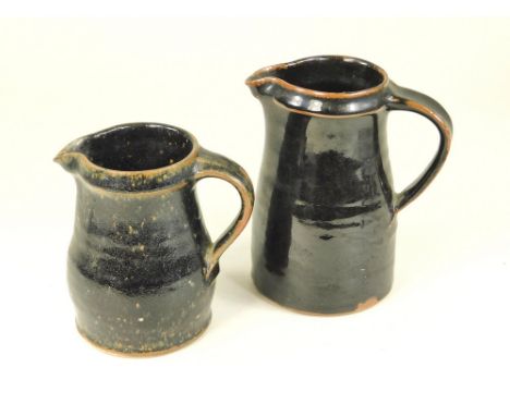 LEACH STANDARD WARE ETC. Two Leach Standard Ware jugs. Pottery mark. Height 16 &amp; 13cm.