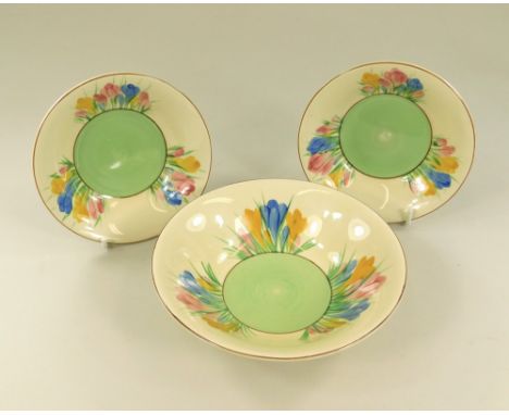 CLARICE CLIFF.A Clarice Cliff, Newport Pottery, 15cm bowl in the spring crocus pattern & a pair of 12cm Clarice Cliff bowls b