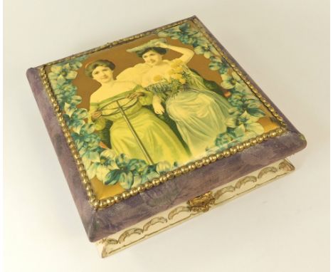 DRESSING CASE.A lady's early 20th century dressing case, the lid with celluloid lithograph showing a lady motorist. No interi