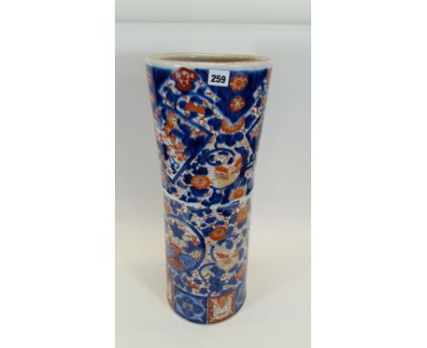 A LARGE LATE 19TH CENTURY JAPANESE IMARI PORCELAIN STICK STAND of cylindrical form with all over floral and bird decoration i