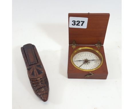 A SMALL 19TH CENTURY POCKET COMPASS, circular paper dial, in a mahogany case, 2 3/4 ins square and a 19th Century carved oak 